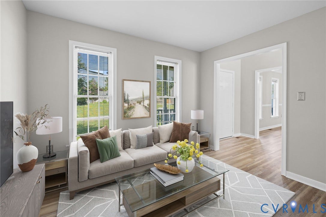 5025 Alberta Mews, Chesterfield, VA 23832 Spacious living area featuring LVP flooring, white trim, and light gray wall paint. Virtually staged concept