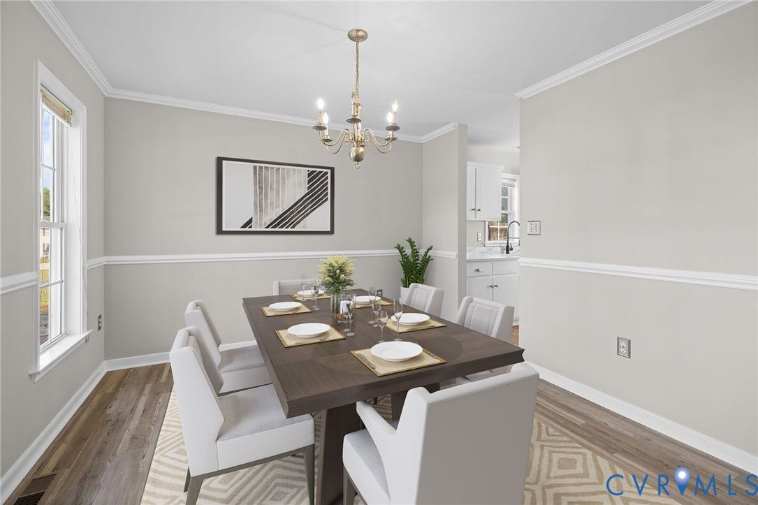 5025 Alberta Mews, Chesterfield, VA 23832 Dining area featuring LVP flooring, a contemporary chandelier, crown molding, chair rail molding, and a double-hung window. Virtually staged concept