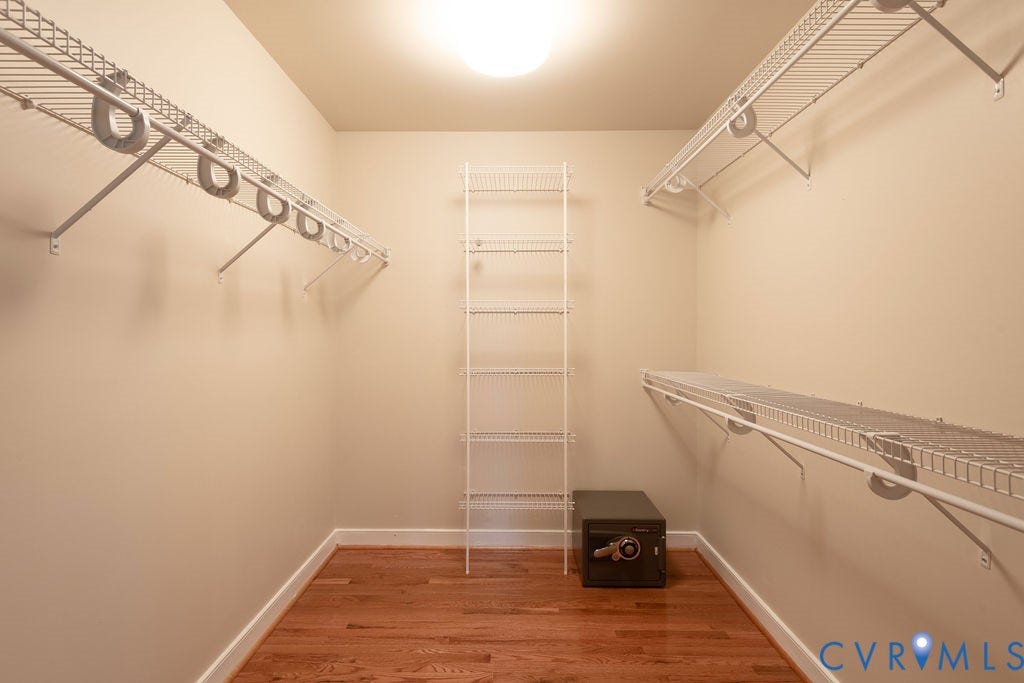 4924 Sadler Glen Ct, Sadler Glen, Glen Allen, VA 23060 Hardwood flooring complements the built-in wire shelving and hanging rods