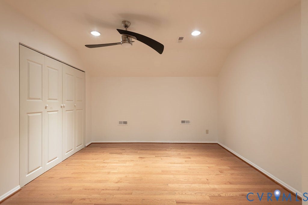 4924 Sadler Glen Ct, Sadler Glen, Glen Allen, VA 23060 Hardwood-style flooring throughout this room, featuring recessed lighting and a ceiling fan