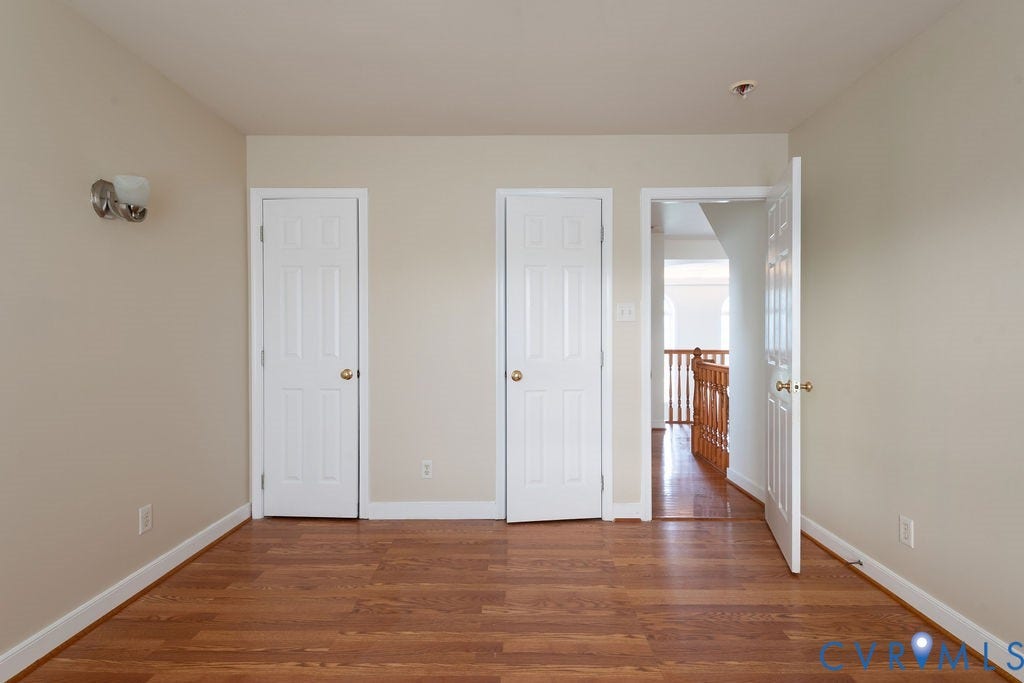 4924 Sadler Glen Ct, Sadler Glen, Glen Allen, VA 23060 Room featuring wood-finish flooring, light neutral wall paint, and white trim