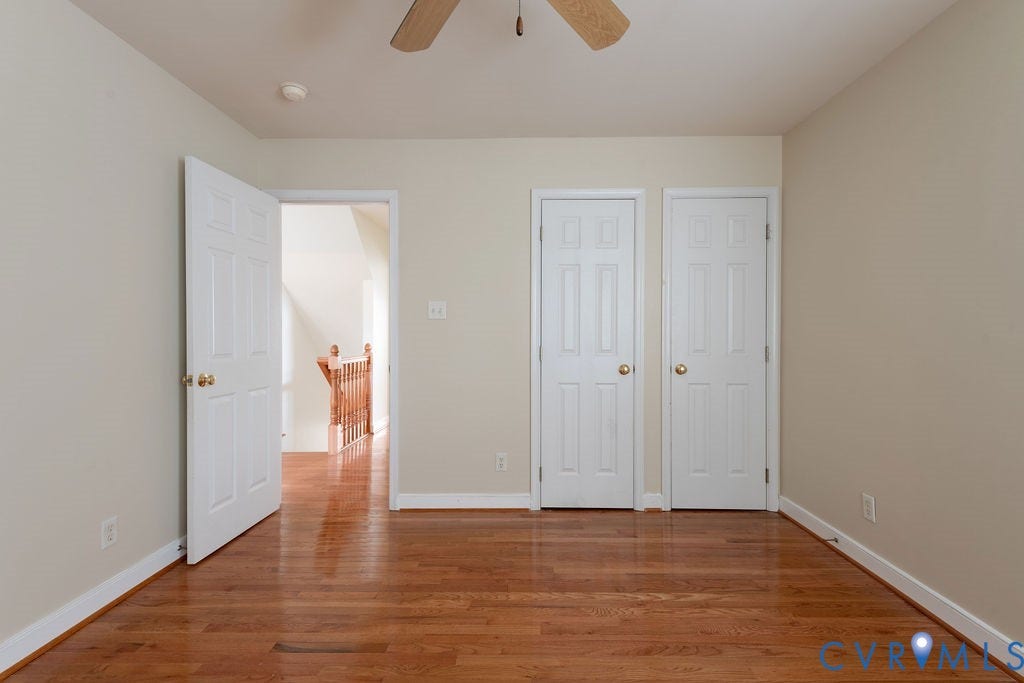 4924 Sadler Glen Ct, Sadler Glen, Glen Allen, VA 23060 Room featuring wood-finish flooring, light-colored walls, white trim, and a ceiling fan