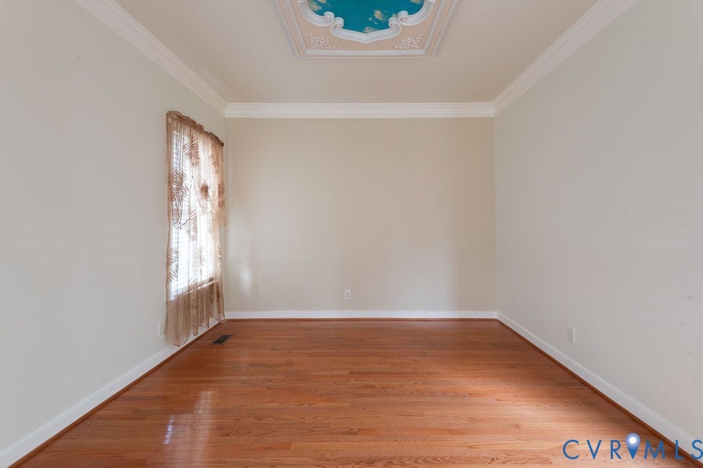 4924 Sadler Glen Ct, Sadler Glen, Glen Allen, VA 23060 Recessed ceiling detail with painted accents, crown molding, wood-finish flooring, and a window with sheer drapes