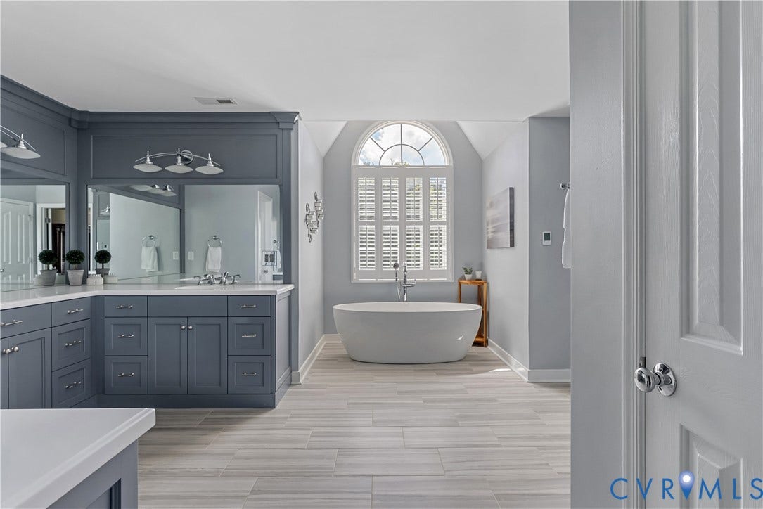5009 Sadler Place Terrace, Glen Allen, VA 23060 Spacious bathroom with freestanding tub, dual vanities, custom shower, water closet, linen closet
