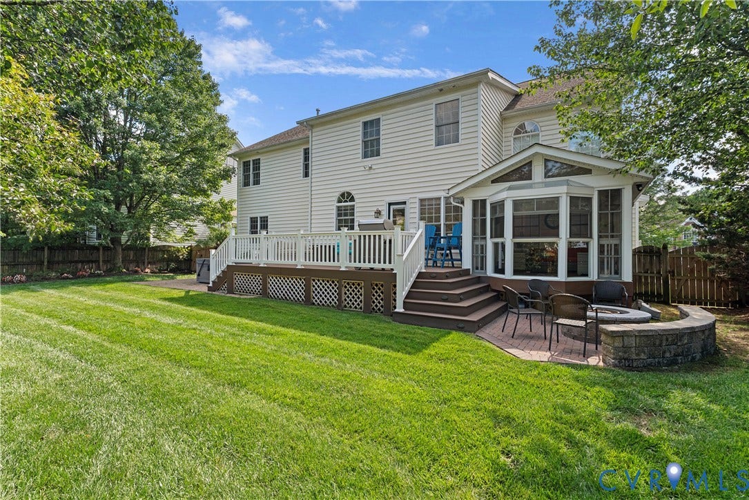 5009 Sadler Place Terrace, Glen Allen, VA 23060 Backyard featuring composite deck, screened porch, built-in fire pit, and saltwater spa