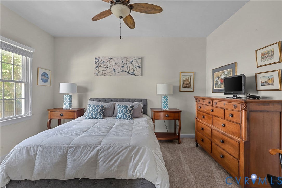 5009 Sadler Place Terrace, Glen Allen, VA 23060 First floor bedroom with private full bath, carpet, and ceiling fan
