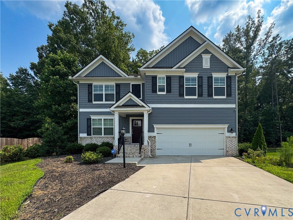 5849 Hereld Green Drive, Chesterfield, VA 23832 Contemporary two-story residence featuring grey siding and dark shutters