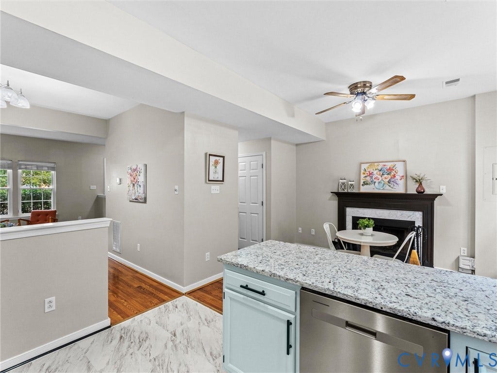 10100 Robin Lee Lane, Laurel Lakes, Glen Allen, VA 23060 Kitchen island with a granite countertop and integrated stainless steel dishwasher