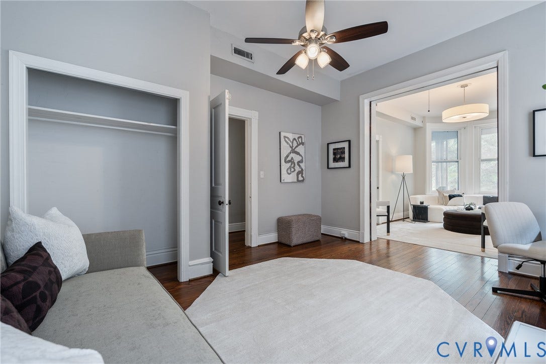 2016 Princess Anne Avenue, Union Hill, Richmond, VA 23223 Hardwood flooring and light gray walls complement the built-in closet with shelving and hanging rod
