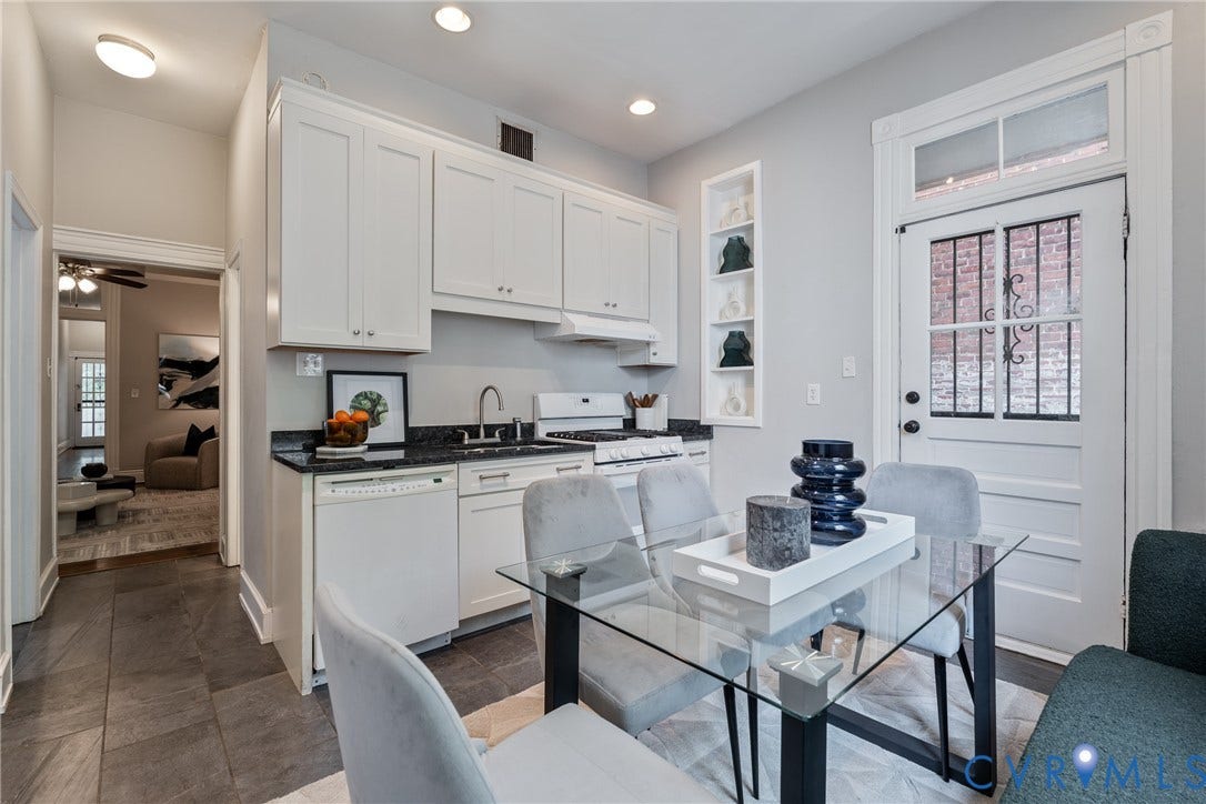 2016 Princess Anne Avenue, Union Hill, Richmond, VA 23223 Kitchen area featuring white cabinetry, dark stone countertops, a white dishwasher, a white range, and slate-finish floor tiling