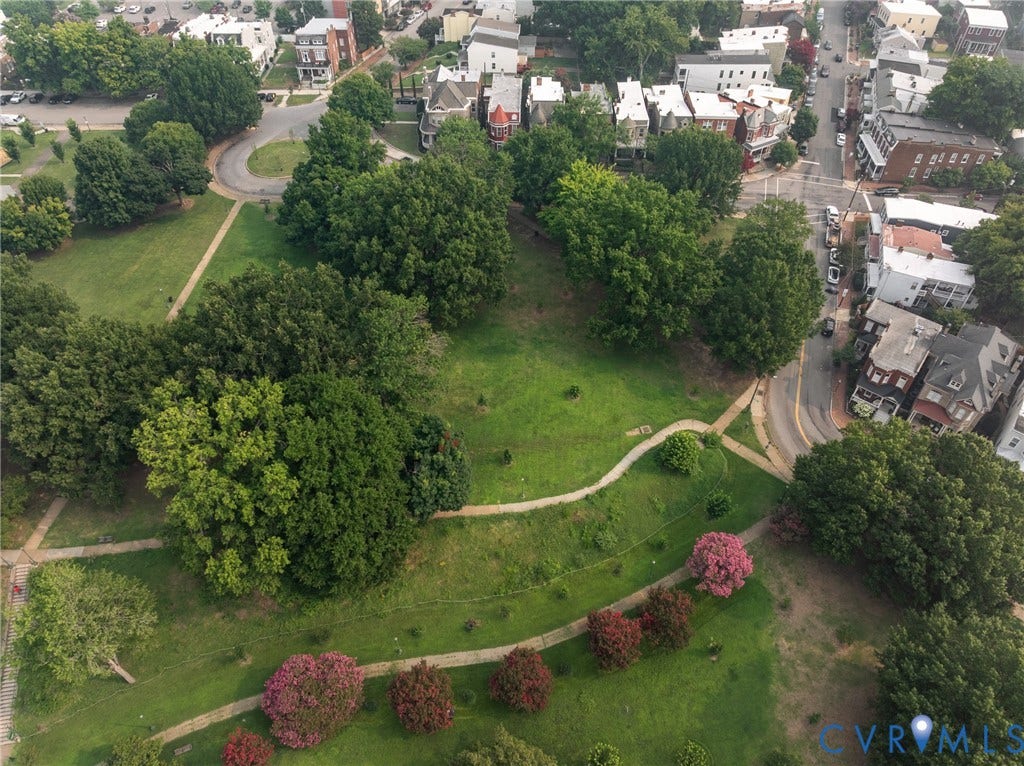 2016 Princess Anne Avenue, Union Hill, Richmond, VA 23223 Expansive green space featuring mature trees and winding pedestrian pathways