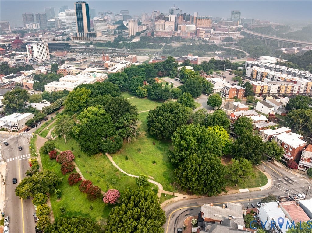 2016 Princess Anne Avenue, Union Hill, Richmond, VA 23223 Expansive green space featuring mature trees and winding pedestrian paths