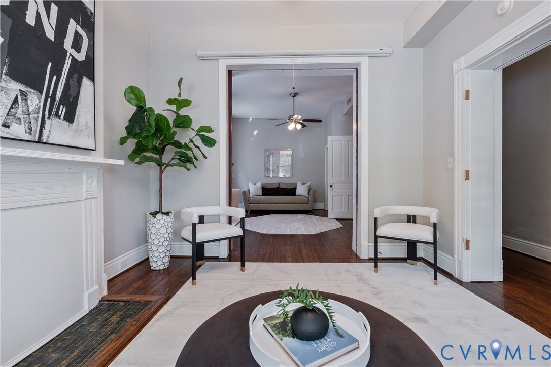 2016 Princess Anne Avenue, Union Hill, Richmond, VA 23223 Hardwood flooring throughout, bright wall paint, and a traditional fireplace mantel