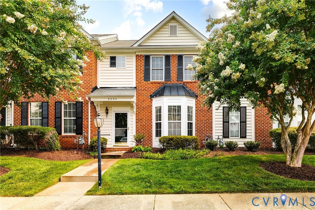 8004 Creekside Village Drive, Creekside Village, Mechanicsville, VA 23111 Brick-front exterior with white siding accents and a bay window