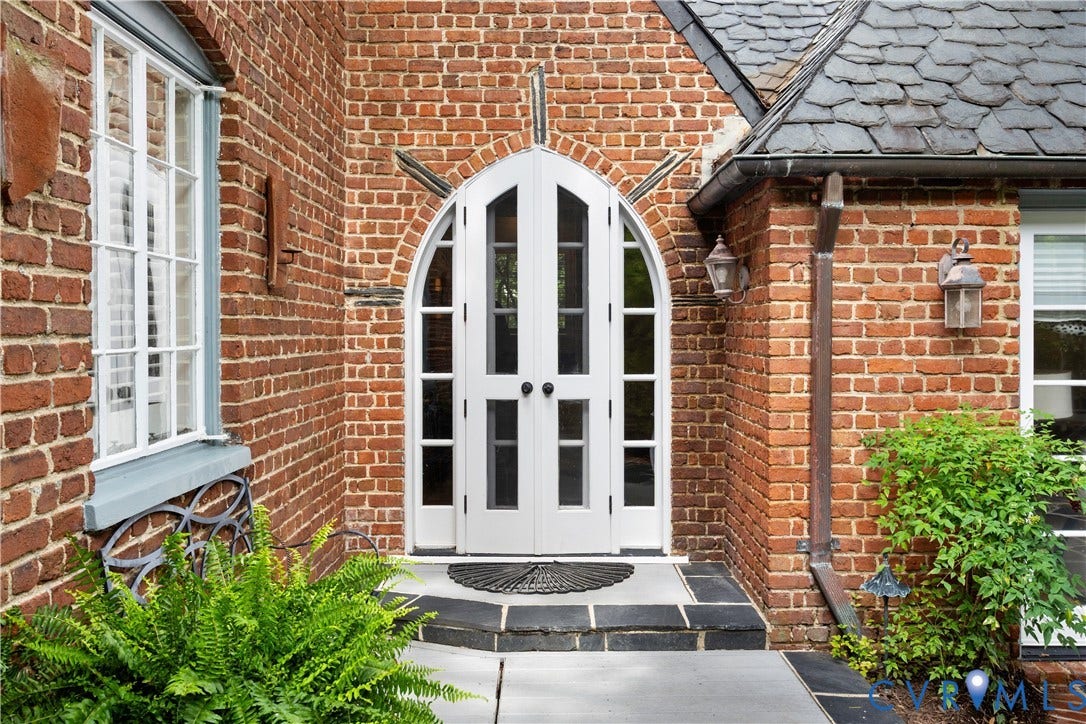 Patio to kitchen.  Note copper downspouts.