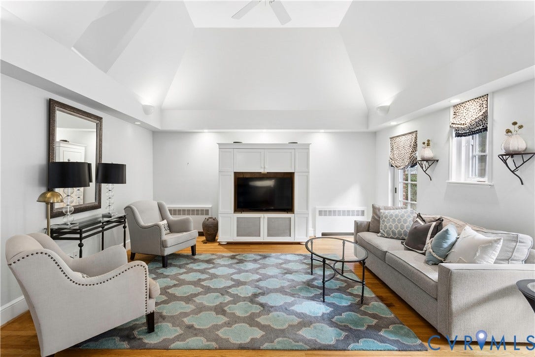 Down just 2 steps from the kitchen, you will love spending time in this spacious family room.