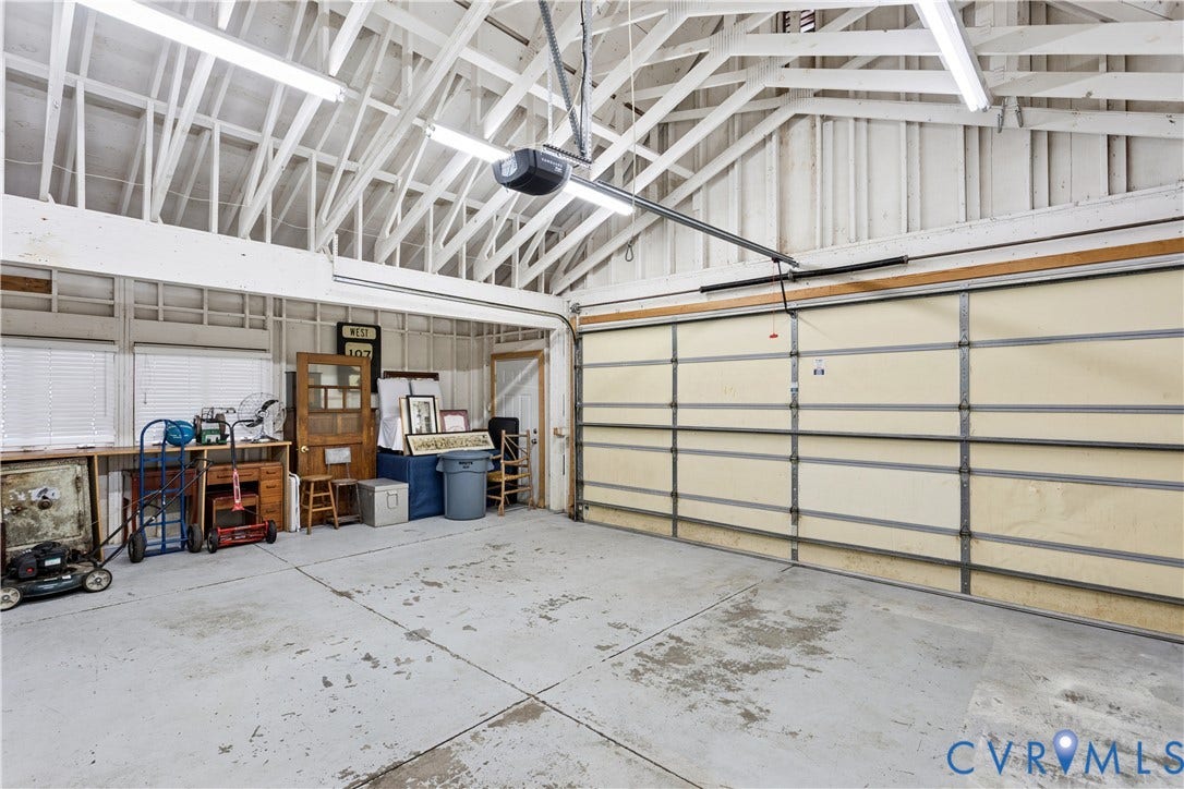 2 car + 21' x 6'6" area. Wild potential here.