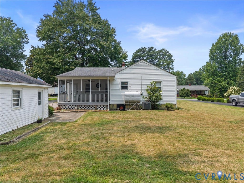 9633 Shamrock Drive, Centralia Gardens/Salem Woods, Chesterfield, VA 23237 Spacious backyard with a screened porch, a detached storage building, mature trees, and a concrete patio area