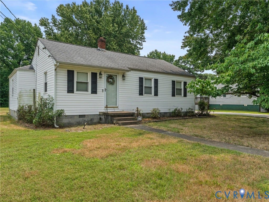 9633 Shamrock Drive, Centralia Gardens/Salem Woods, Chesterfield, VA 23237 White siding exterior with a shingled roof and brick chimney