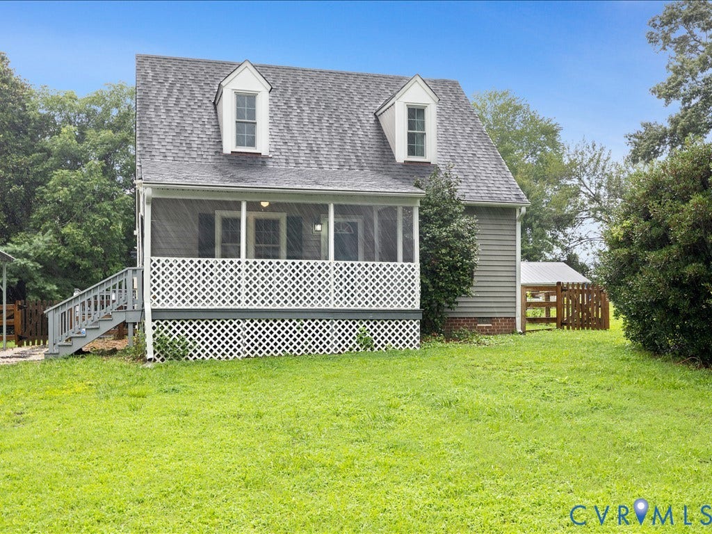 12230 Harrowgate Road, Chesterfield, VA 23831 Two-story residence featuring a screened porch with white lattice detailing, a shingle roof, and two dormer windows