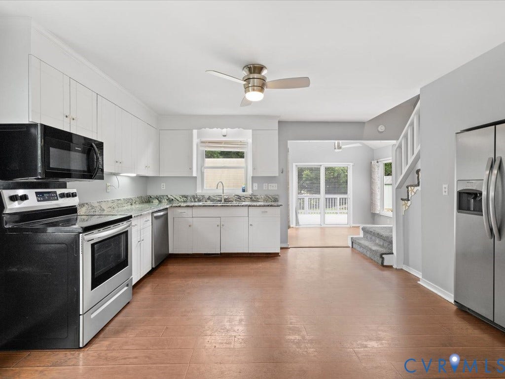 12230 Harrowgate Road, Chesterfield, VA 23831 Kitchen featuring white cabinetry, a stainless steel electric range, an over-range microwave, and a side-by-side refrigerator
