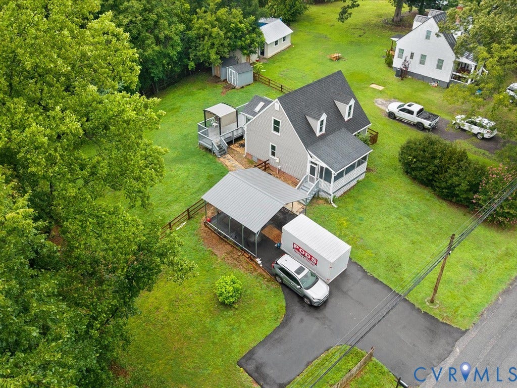 12230 Harrowgate Road, Chesterfield, VA 23831 Aerial perspective showcasing a light gray residence with a dark shingled roof and dormer windows