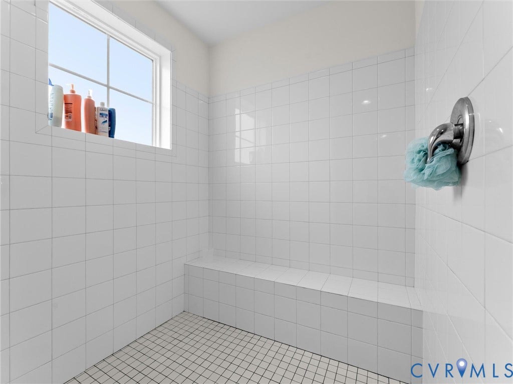6642 Stonewolf Court, Moseley, VA 23120 Primary Bathroom tiled Shower is large and spacious with a bench area.
