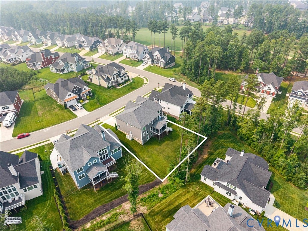 6642 Stonewolf Court, Moseley, VA 23120 Aerial perspective showcasing a residential neighborhood with varied architectural styles