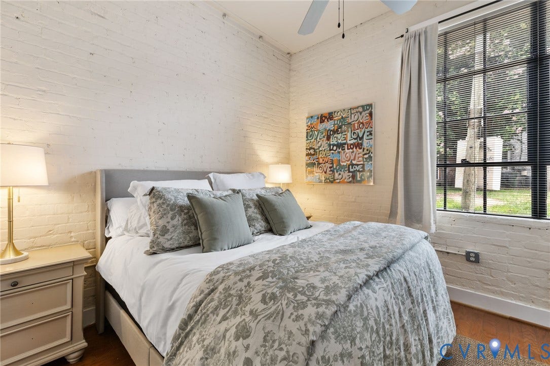 2318 Herbert Hamlet Alley, #U4, Richmond, VA 23220 Bedroom has nice natural light, ceiling fan and great character of the painted brick on two walls...