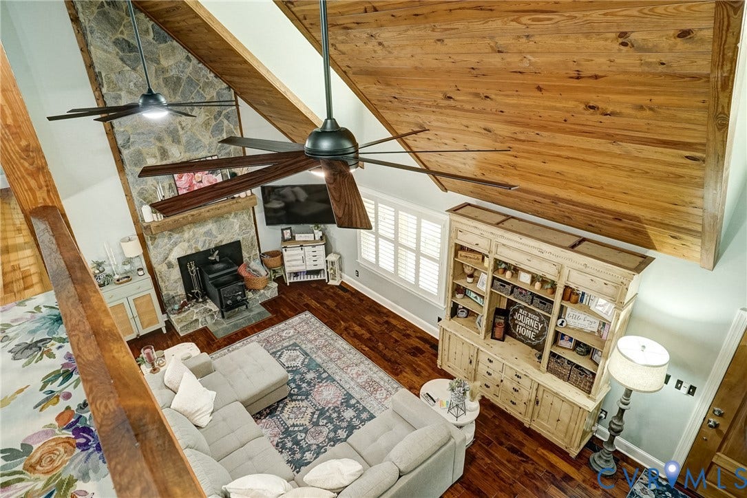 1174 Dorset Road, Powhatan, VA 23139 Vaulted ceiling with wood-finish planks and exposed wood beams
