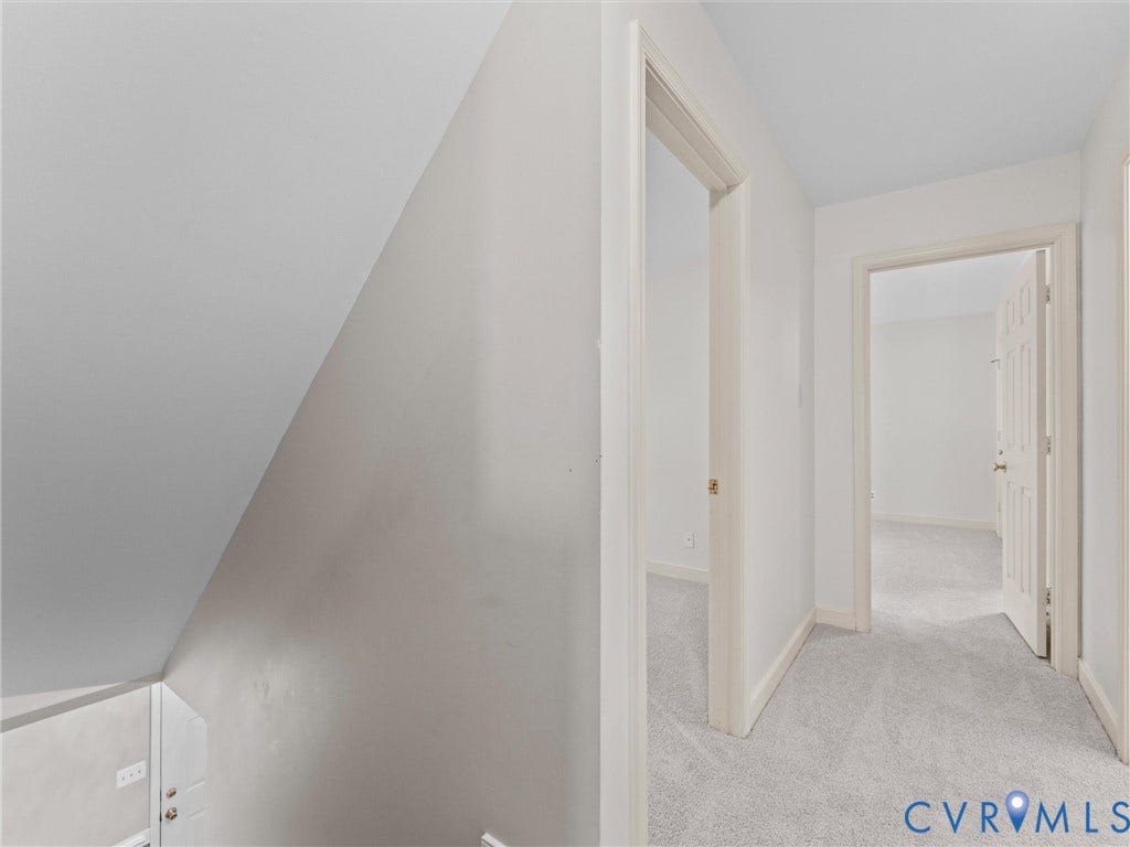 Second-level hallway featuring new carpeting and padding