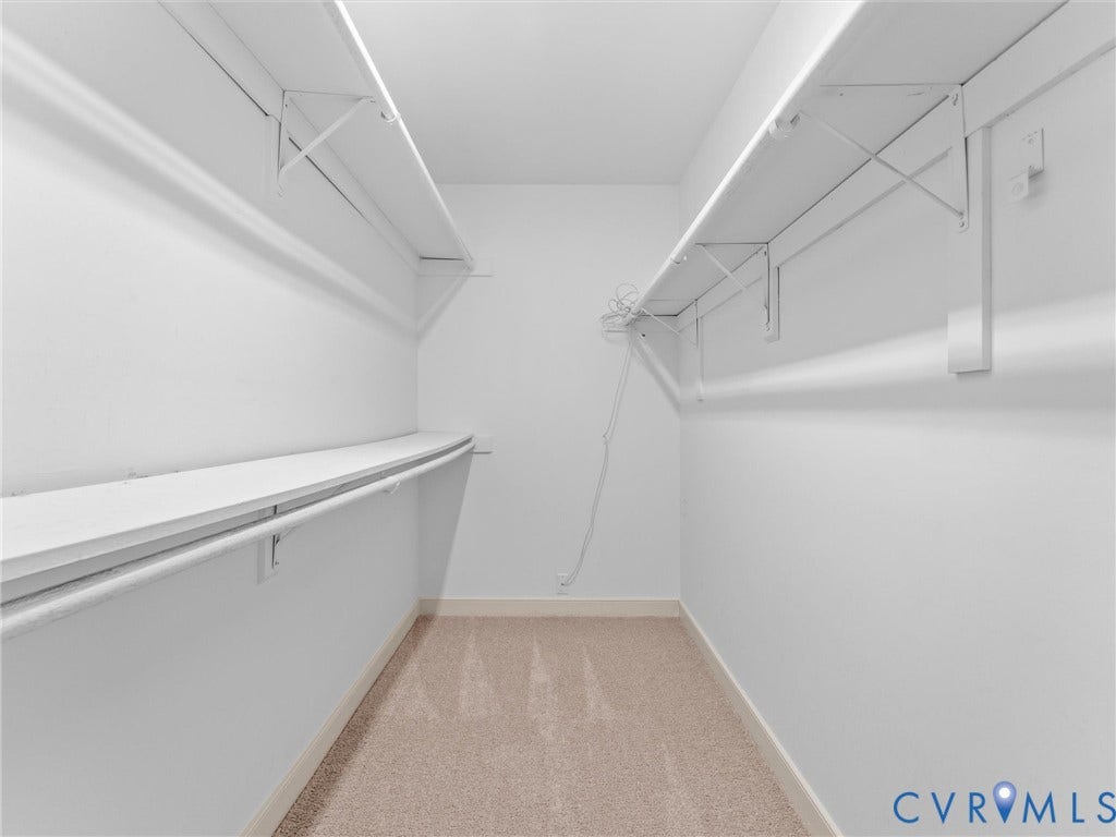 Walk-in closet with ample storage solutions