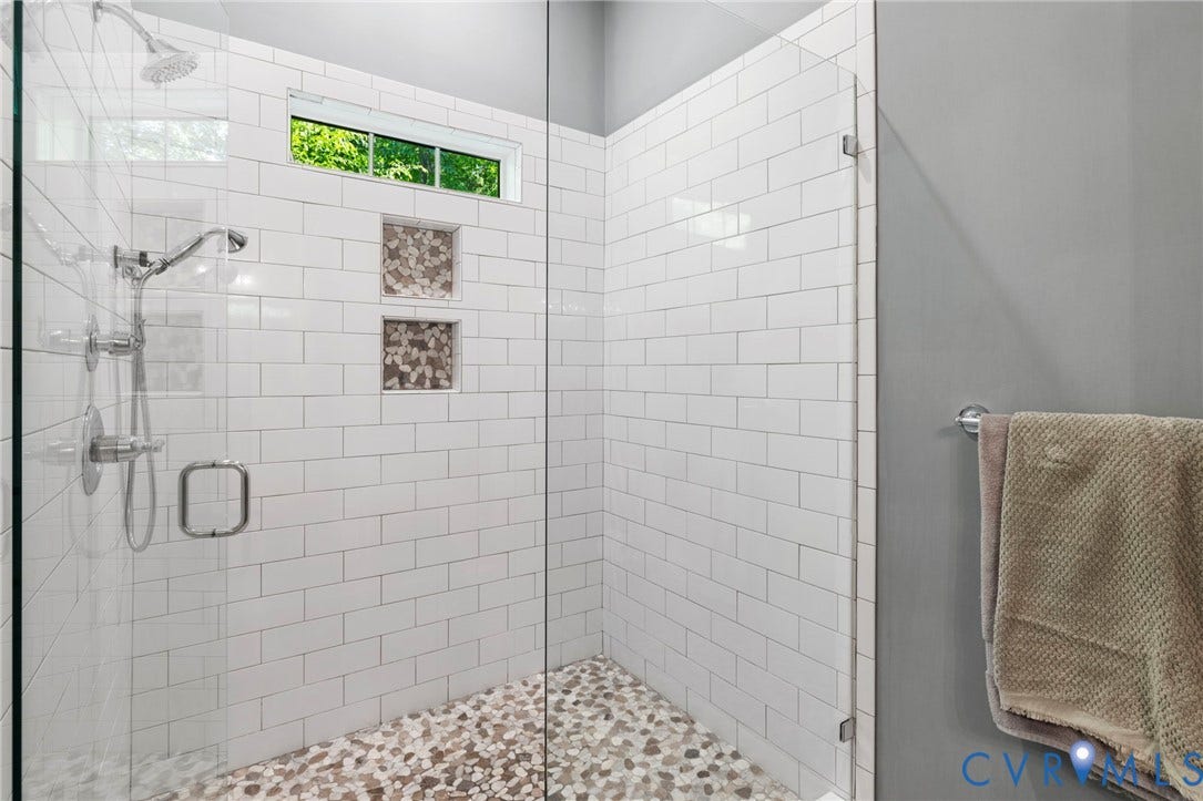 1925 Muswell Court, Hallsley, Midlothian, VA 23112 Enclosed shower featuring white subway tile walls and a pebble-style floor