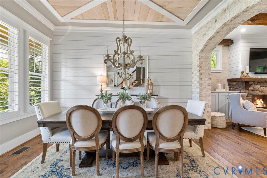 1925 Muswell Court, Hallsley, Midlothian, VA 23112 Dining area featuring wood-finish flooring, shiplap wall treatment, and a coffered ceiling with a wood-plank inlay