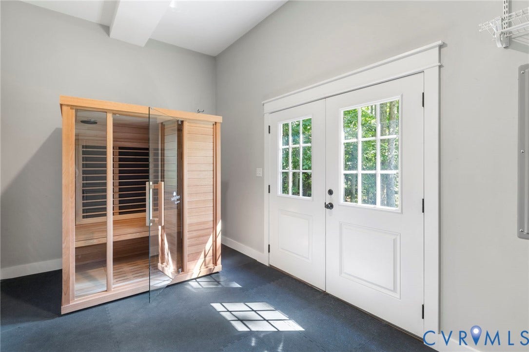 1925 Muswell Court, Hallsley, Midlothian, VA 23112 Built-in sauna with wood and glass construction, paired with double French doors featuring muntin grids