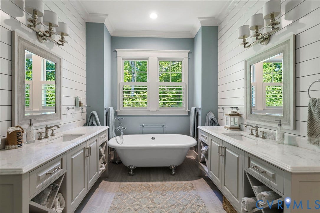 1925 Muswell Court, Hallsley, Midlothian, VA 23112 Freestanding clawfoot tub centered under a window with plantation shutters
