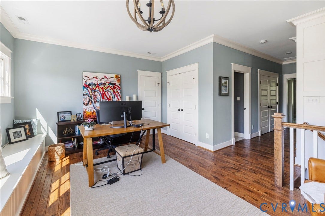 1925 Muswell Court, Hallsley, Midlothian, VA 23112 Spacious room featuring wood-finish flooring, a built-in window seat, crown molding, and two sets of double-door closets