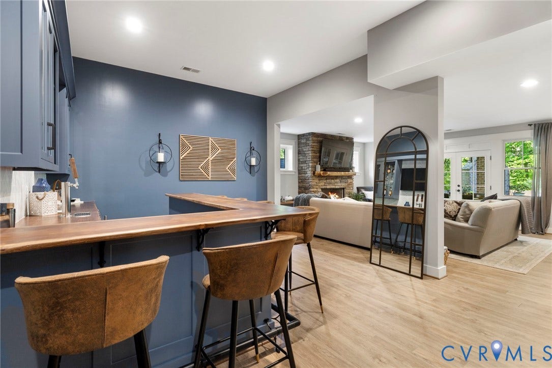 1925 Muswell Court, Hallsley, Midlothian, VA 23112 Built-in bar with wood-finish countertop and blue cabinetry, featuring recessed lighting and wood-finish flooring