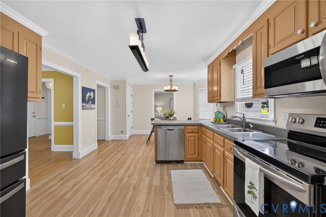 8436 Sir Lionel Place, Kingsland Wood, Ampthill, VA 23237 Kitchen featuring wood-finish flooring, stainless steel appliances, wood cabinetry, and recessed lighting