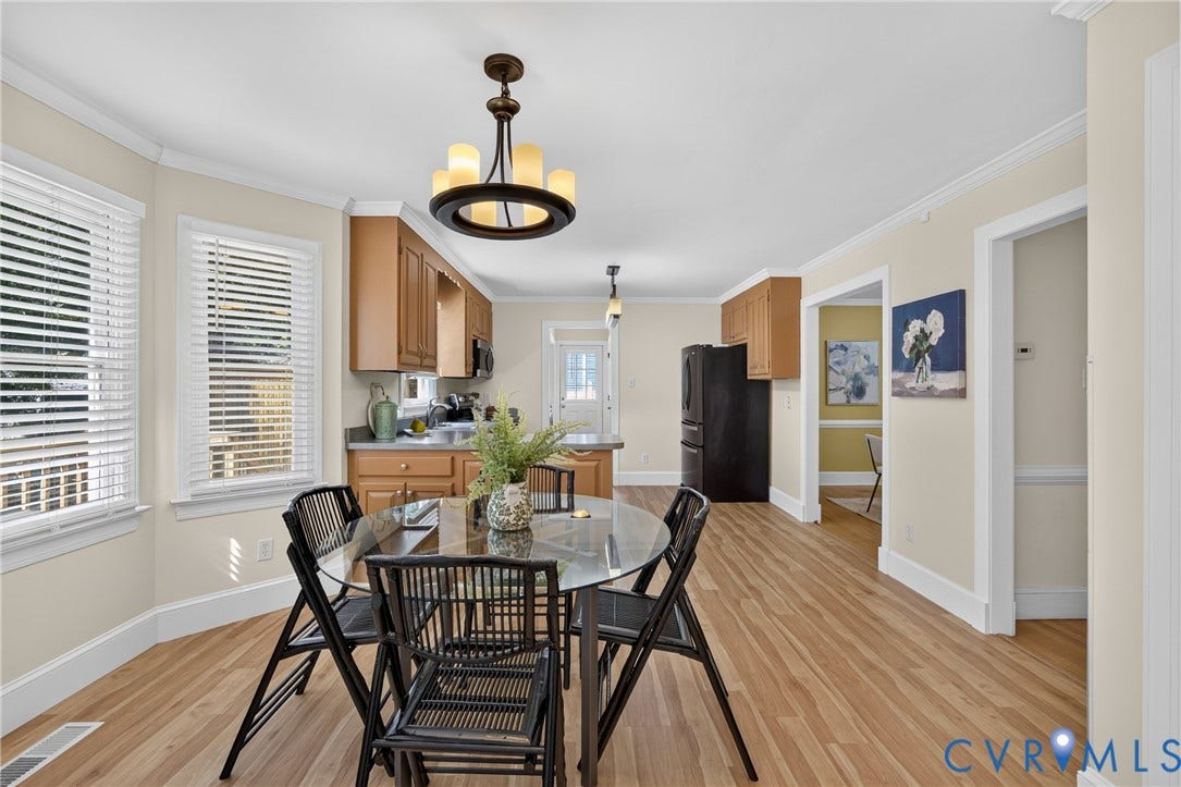 8436 Sir Lionel Place, Kingsland Wood, Ampthill, VA 23237 Wood-finish flooring throughout, bay windows with blinds, recessed lighting, and a kitchen featuring wood cabinetry