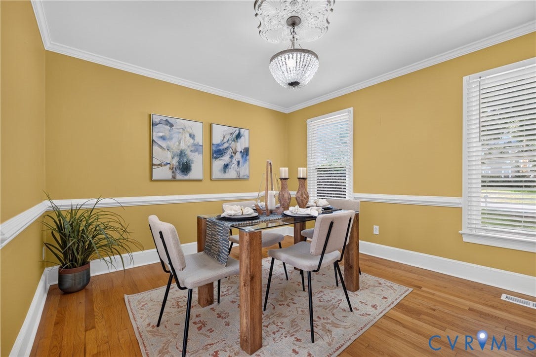 8436 Sir Lionel Place, Kingsland Wood, Ampthill, VA 23237 Hardwood flooring, crown molding, chair rail molding, two windows, and a ceiling light fixture