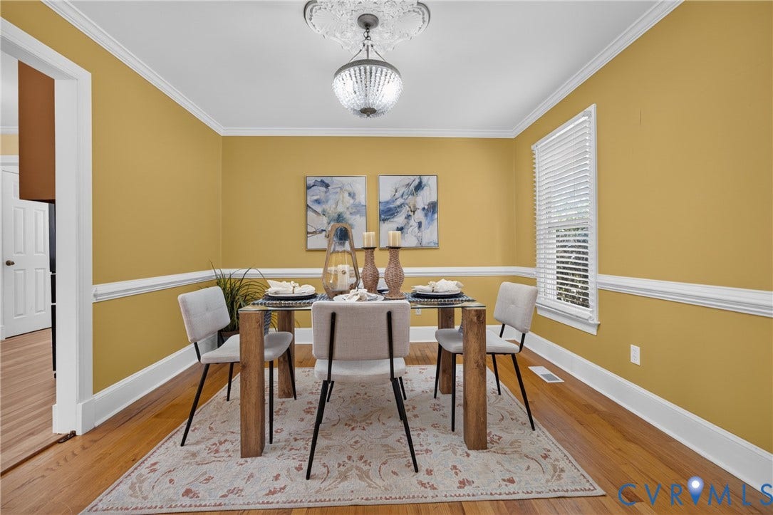 8436 Sir Lionel Place, Kingsland Wood, Ampthill, VA 23237 Hardwood flooring, crown molding, chair rail, and a decorative ceiling medallion with a chandelier