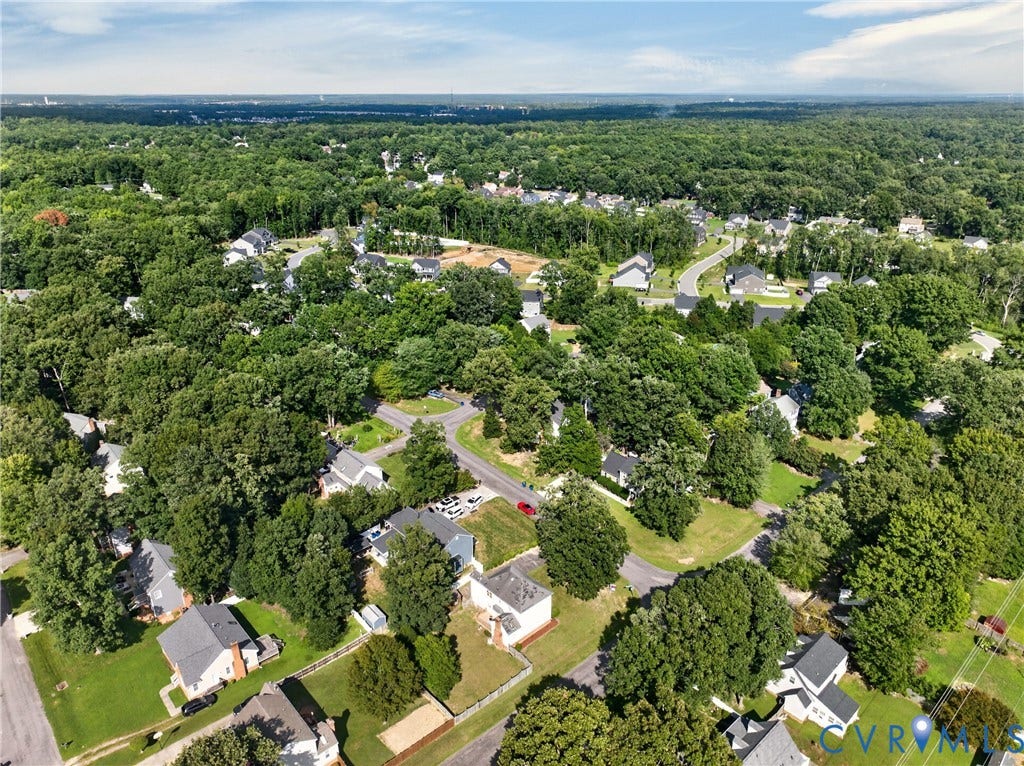 8436 Sir Lionel Place, Kingsland Wood, Ampthill, VA 23237 Expansive green landscape with mature trees and residential homes