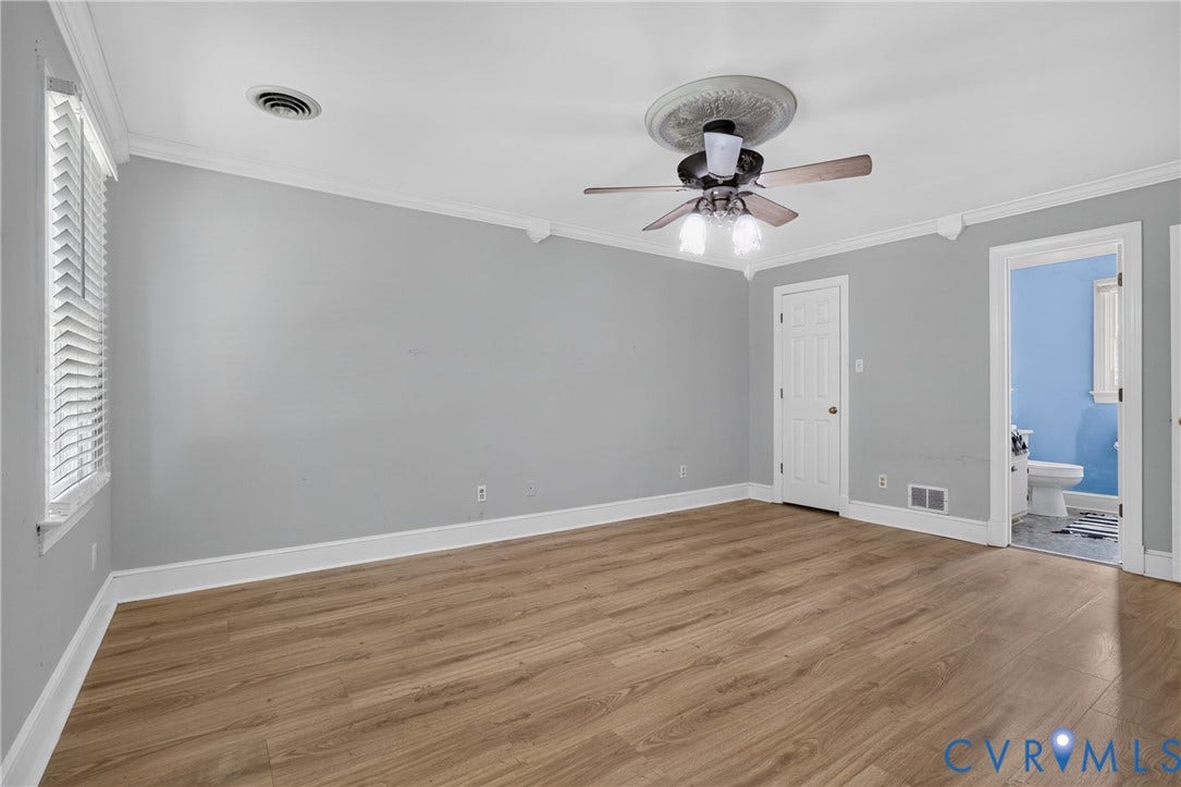 8436 Sir Lionel Place, Kingsland Wood, Ampthill, VA 23237 Wood-finish flooring, crown molding, ceiling fan with light fixture, window with blinds, and white interior doors