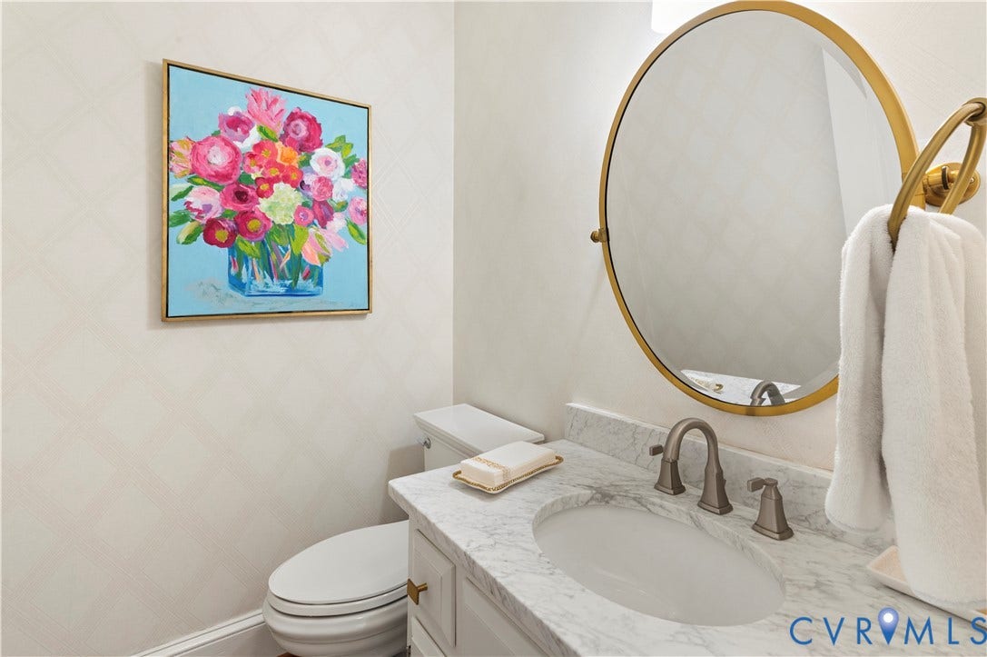 1905 Tunbridge Drive, Henrico, VA 23238 Vanity featuring a stone countertop, undermount sink, and brushed nickel faucet