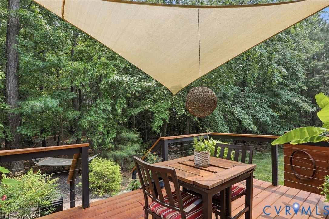 3655 Stone Harbor Drive, Midlothian, VA 23113 Wood deck with cable railings and a triangular shade sail