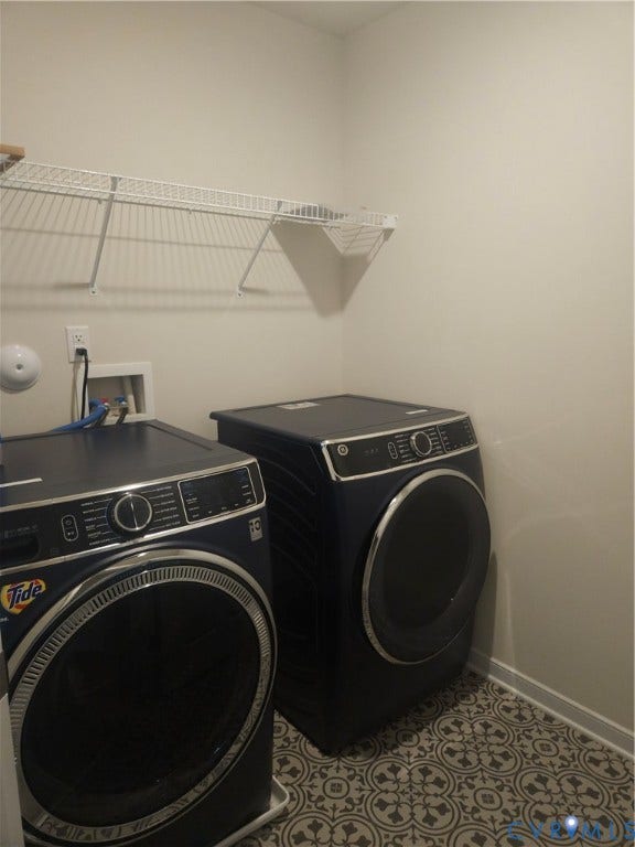 11304 Magill Terrace Drive, Chester, VA 23831 Laundry area featuring geometric patterned tile flooring and built-in wire shelving