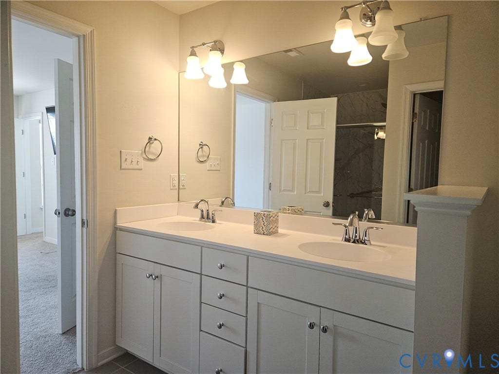 11304 Magill Terrace Drive, Chester, VA 23831 Dual vanity with integrated sinks and chrome fixtures