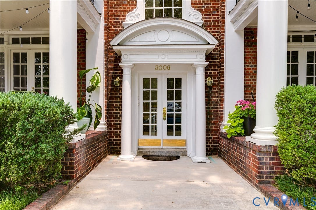 3006 Monument Avenue, #U2W, Museum District, Richmond, VA 23221 Brick exterior featuring a portico with white columns and an arched pediment