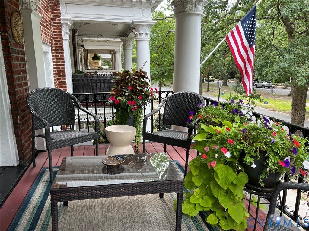 3006 Monument Avenue, #U2W, Museum District, Richmond, VA 23221 Brick exterior with a covered porch featuring decorative columns, an ornate railing, and a painted floor